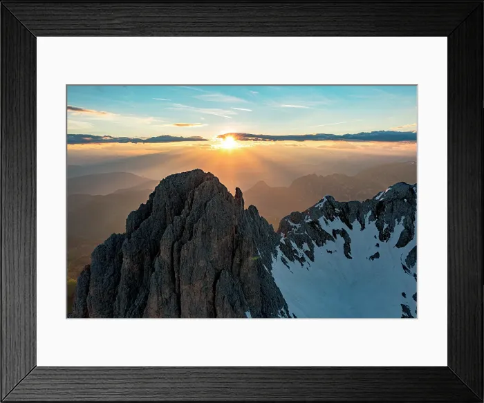 Framed Print : Scenic sunset over Catinaccio Rosengarten snowy mountain peaks, aerial view, Val di Fassa, Dolomites, South Tyrol, Italy Framed Print : Scenic sunset over Catinaccio Rosengarten snowy mountain peaks, aerial view, Val di Fassa, Dolomites, South Tyrol, Italy