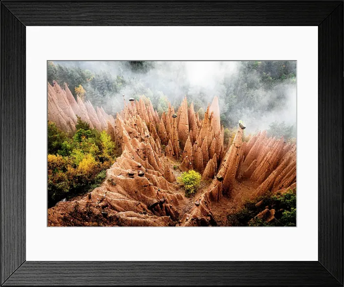 Framed Print : Earth Pyramids red rock pinnacles emerging from fog in the autumn woods, Soprabolzano, Renon / Ritten, Bolzano, South Tyrol, Italy Framed Print : Earth Pyramids red rock pinnacles emerging from fog in the autumn woods, Soprabolzano, Renon / Ritten, Bolzano, South Tyrol, Italy