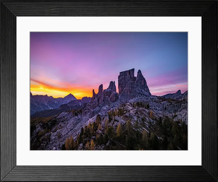 Framed Print : Multicolored sky at dawn over the rocky peaks of Cinque Torri in autumn, Ampezzo Dolomites Natural Park, Veneto, Italy Framed Print : Multicolored sky at dawn over the rocky peaks of Cinque Torri in autumn, Ampezzo Dolomites Natural Park, Veneto, Italy