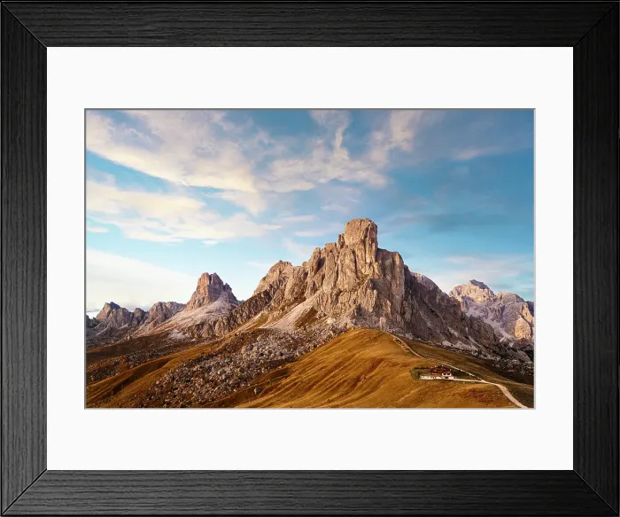 Framed Print : Clouds over an empty mountain road at Giau pass at feet of majestic Ra Gusela during the autumn sunset, Dolomites, Veneto, Italy Framed Print : Clouds over an empty mountain road at Giau pass at feet of majestic Ra Gusela during the autumn sunset, Dolomites, Veneto, Italy
