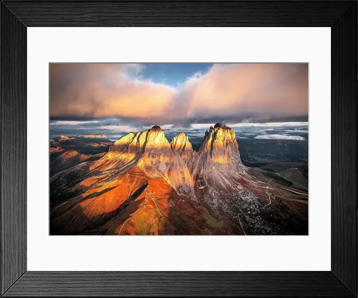 Framed Print : Aerial view of Sassopiatto and Sassolungo under pink clouds in the scenic autumn sky at dawn, Val di Fassa, Dolomites, Italy Framed Print : Aerial view of Sassopiatto and Sassolungo under pink clouds in the scenic autumn sky at dawn, Val di Fassa, Dolomites, Italy