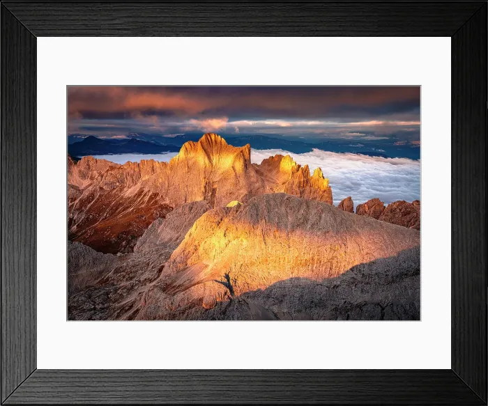 Framed Print : Warm autumn sunrise over the majestic peaks of Catinaccio (Rosengarten) and Torri Del Vajolet, aerial view, Dolomites, Italy Framed Print : Warm autumn sunrise over the majestic peaks of Catinaccio (Rosengarten) and Torri Del Vajolet, aerial view, Dolomites, Italy