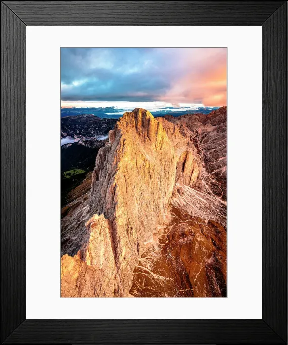 Framed Print : Dramatic sky at dawn over Catinaccio (Rosengarten) and Cima Catinaccio mountains in autumn, aerial view, Dolomites, Italy Framed Print : Dramatic sky at dawn over Catinaccio (Rosengarten) and Cima Catinaccio mountains in autumn, aerial view, Dolomites, Italy