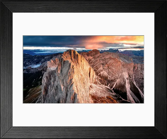 Framed Print : Rocky peaks of Catinaccio (Rosengarten) and Cima Catinaccio mountains at sunrise in autumn, helicopter view, Dolomites, Italy Framed Print : Rocky peaks of Catinaccio (Rosengarten) and Cima Catinaccio mountains at sunrise in autumn, helicopter view, Dolomites, Italy