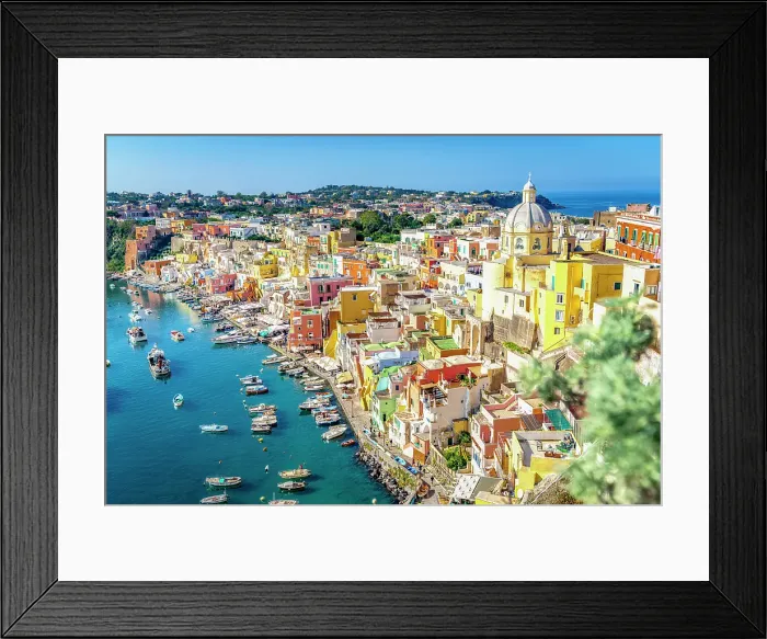 Framed Print : Clear sky over Procida island and harbor overlooking the crystal clear sea, Gulf of Naples, Campania, Italy
