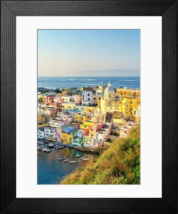 Framed Print : Vibrant colors of the old town seen from hilltop at sunset, Procida island, Gulf of Naples, Campania, Italy Framed Print : Vibrant colors of the old town seen from hilltop at sunset, Procida island, Gulf of Naples, Campania, Italy