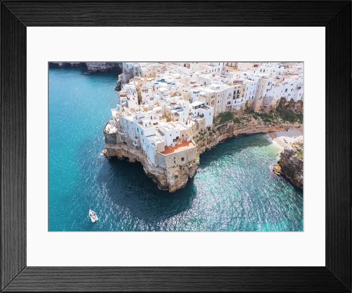 Framed Print : Italy, Puglia, Polignano a Mare, aerial view over whitewashed coastal town Framed Print : Italy, Puglia, Polignano a Mare, aerial view over whitewashed coastal town