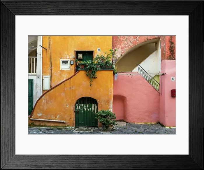Framed Print : Casale Vascello, a cluster of colorful old houses in an internal courtyard, Procida, Campania, Italy