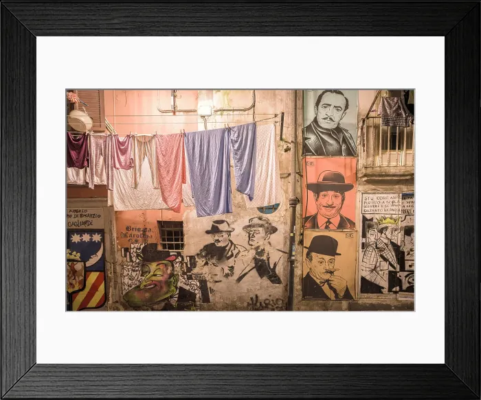 Framed Print : Hanging clothing and murals of Neapolitans celebrities in the Spanish Neighborhood, (Quartieri Spagnoli), Naples, Italy Framed Print : Hanging clothing and murals of Neapolitans celebrities in the Spanish Neighborhood, (Quartieri Spagnoli), Naples, Italy