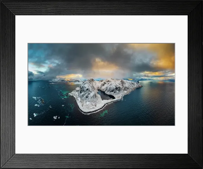 Framed Print : Aerial panoramic of snowcapped mountains and Nedre Heimdalsvatnet lake under clouds at sunset, Eggum, Lofoten Islands, Norway Framed Print : Aerial panoramic of snowcapped mountains and Nedre Heimdalsvatnet lake under clouds at sunset, Eggum, Lofoten Islands, Norway