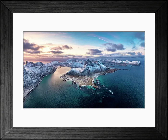 Framed Print : Aerial panoramic view of Flakstad beach surrounded by snowcapped mountains and cold arctic sea, Lofoten Islands, Norway Framed Print : Aerial panoramic view of Flakstad beach surrounded by snowcapped mountains and cold arctic sea, Lofoten Islands, Norway