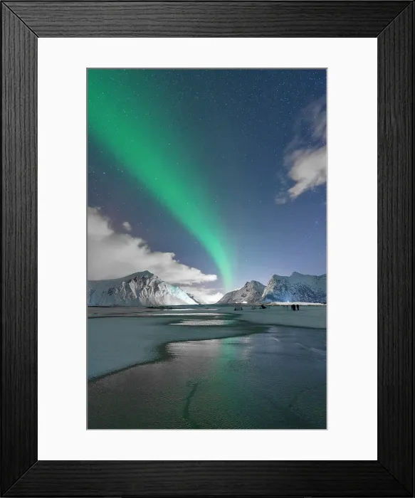 Framed Print : Bright night sky with Aurora Borealis over snowy peaks and frozen Skagsanden beach, Flakstad, Lofoten Islands, Norway