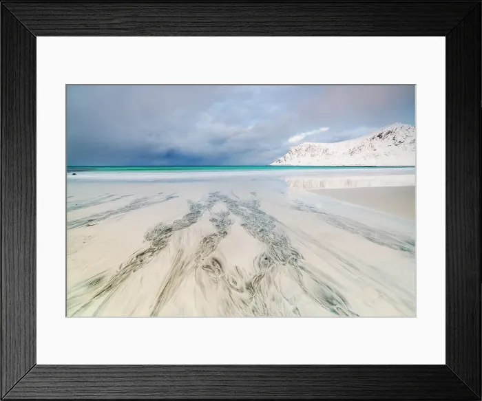 Framed Print : Cloudy sky over the frozen sand of Skagsanden beach, Flakstad, Lofoten Islands, Nordland, Norway