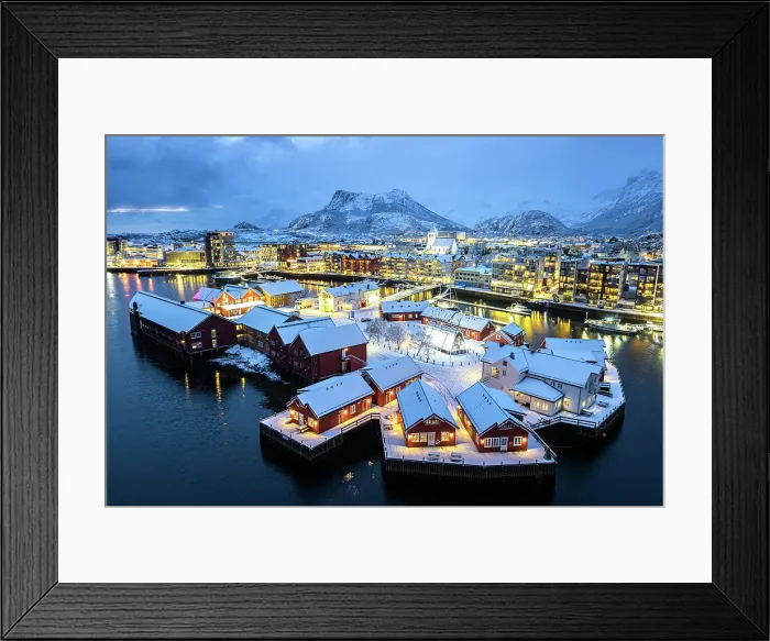 Framed Print : Aerial view of traditional houses covered with snow in the illuminated village of Svolvaer at night, Lofoten Islands, Norway Framed Print : Aerial view of traditional houses covered with snow in the illuminated village of Svolvaer at night, Lofoten Islands, Norway
