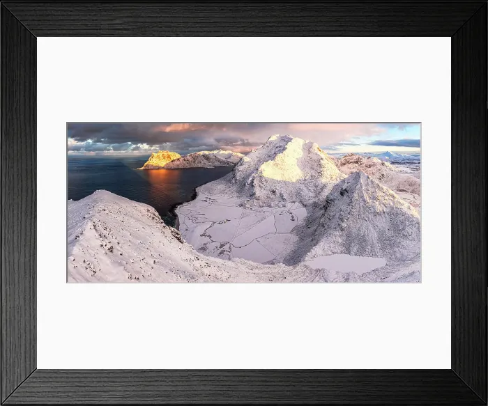 Framed Print : Snowy mountain peaks and frozen beaches at dawn, aerial view, Vestvagoy island, Lofoten Islands, Norway Framed Print : Snowy mountain peaks and frozen beaches at dawn, aerial view, Vestvagoy island, Lofoten Islands, Norway