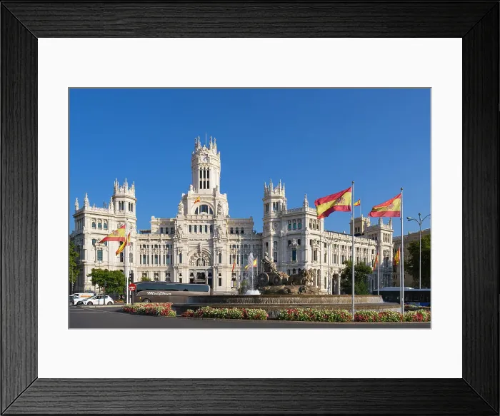 Framed Print : Building of Plaza de Cibeles at traffic circle against blue sky, Madrid, Spain Framed Print : Building of Plaza de Cibeles at traffic circle against blue sky, Madrid, Spain