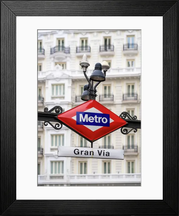 Framed Print : Metro sign at Gran Vía street in Central Madrid, Spain Framed Print : Metro sign at Gran Vía street in Central Madrid, Spain