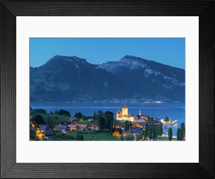 Framed Print : Spiez Castle with Niederhorn mountain in the background at dusk, Spiez, Canton of Bern, Switzerland Framed Print : Spiez Castle with Niederhorn mountain in the background at dusk, Spiez, Canton of Bern, Switzerland