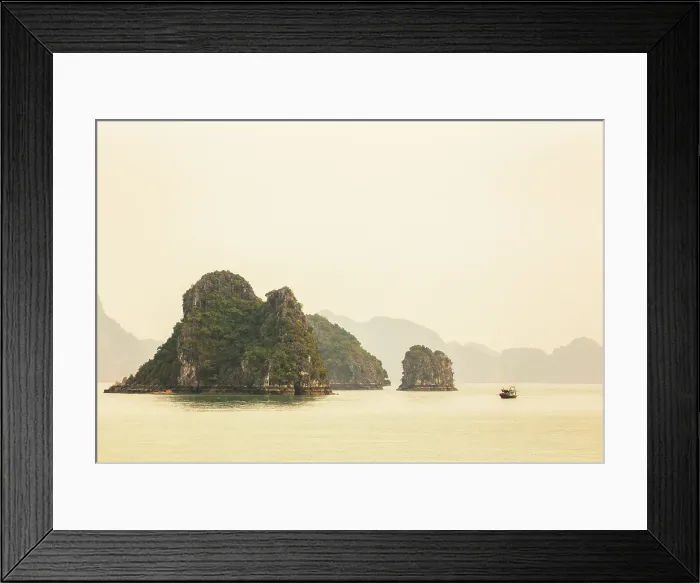 Framed Print : Traditional fishing boat and limestone islands at dawn, Halong Bay, Northeast Vietnam Framed Print : Traditional fishing boat and limestone islands at dawn, Halong Bay, Northeast Vietnam