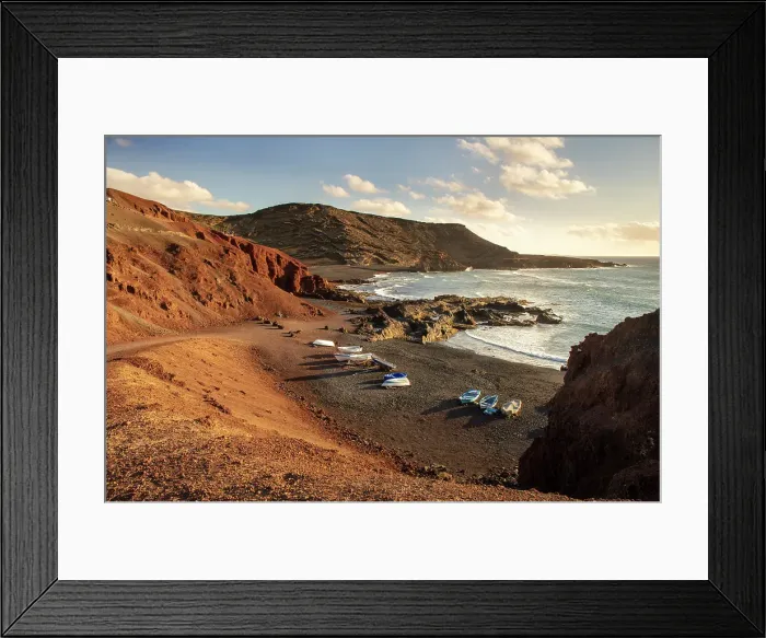 Framed Print : Small boats on the black sand beach at El Golfo, Lanzarote, Canary Islands, Spain Framed Print : Small boats on the black sand beach at El Golfo, Lanzarote, Canary Islands, Spain