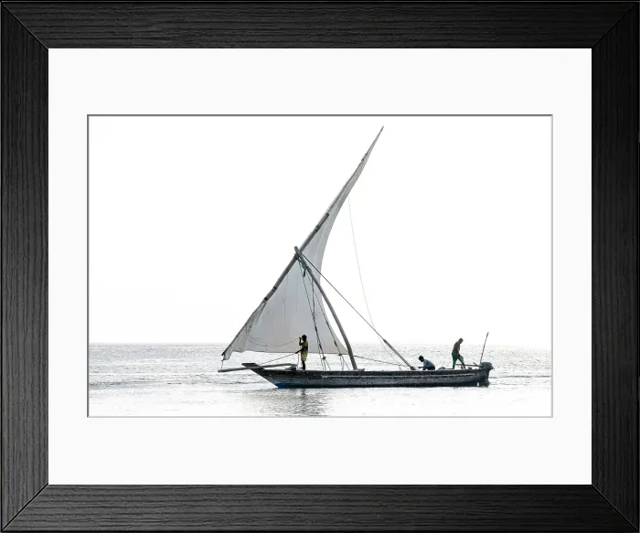 Framed Print : Traditional dhow heading out to sea, Jambiani, Zanzibar, Tanzania Framed Print : Traditional dhow heading out to sea, Jambiani, Zanzibar, Tanzania