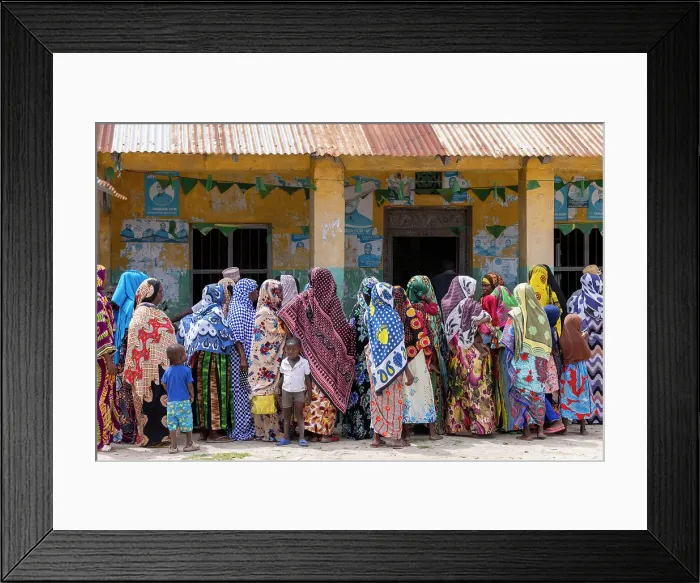 Framed Print : Local women wearing colourful kangas at a village wedding, Bweju, Zanzibar, Tanzania Framed Print : Local women wearing colourful kangas at a village wedding, Bweju, Zanzibar, Tanzania