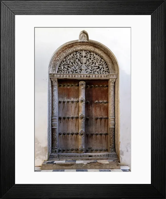 Framed Print : Old heavy carved wooden door, Stonetown, Zanzibar, Tanzania Framed Print : Old heavy carved wooden door, Stonetown, Zanzibar, Tanzania