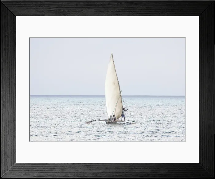 Framed Print : Traditional dhow heading out to sea, Jambiani, Zanzibar, Tanzania Framed Print : Traditional dhow heading out to sea, Jambiani, Zanzibar, Tanzania