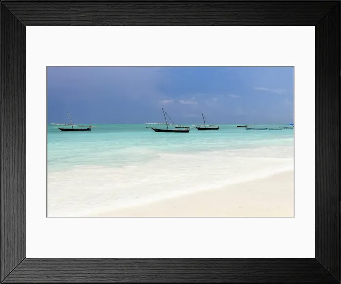 Framed Print : Traditional dhows moored in shallow sea near the beach, Nungwi, Zanzibar, Tanzania Framed Print : Traditional dhows moored in shallow sea near the beach, Nungwi, Zanzibar, Tanzania