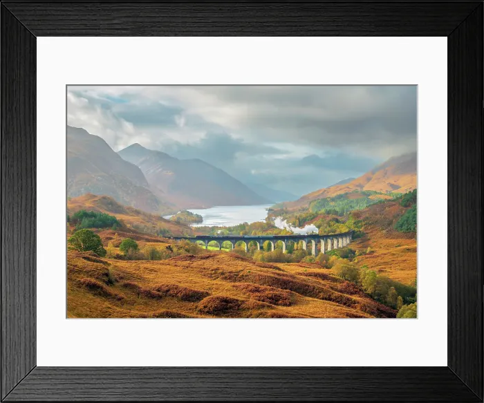 Framed Print : UK, Scotland, Highland, Loch Shiel, Glenfinnan, Glenfinnan Railway Viaduct, part of the West Highland Line, made famous in JK Rowling's Harry Potter as the Hogwarts Express Framed Print : UK, Scotland, Highland, Loch Shiel, Glenfinnan, Glenfinnan Railway Viaduct, part of the West Highland Line, made famous in JK Rowling's Harry Potter as the Hogwarts Express