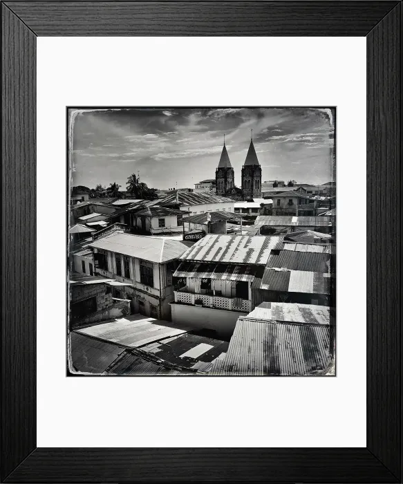 Framed Print : View over rooftops to St Joseph's Cathedral, Stonetown, Zanzibar, Tanzania Framed Print : View over rooftops to St Joseph's Cathedral, Stonetown, Zanzibar, Tanzania