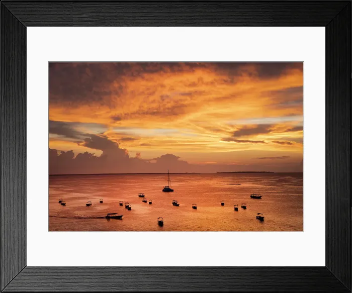 Framed Print : Boats on the sea in silhouette at sunset, Nungwi, Zanzibar, Tanzania Framed Print : Boats on the sea in silhouette at sunset, Nungwi, Zanzibar, Tanzania