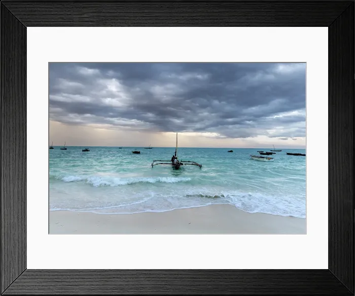 Framed Print : Local fishermen on a traditional dhow, in stormy weather, Nungwi, Zanzibar, Tanzania