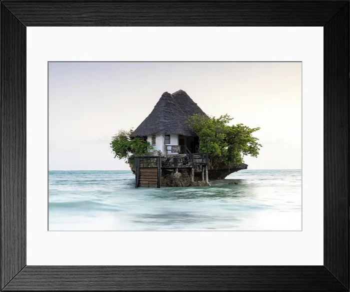 Framed Print : The Rock, a small restaurant built on a coral outcrop in the sea off Michamvi Pingwe Beach, Zanzibar, Tanzania Framed Print : The Rock, a small restaurant built on a coral outcrop in the sea off Michamvi Pingwe Beach, Zanzibar, Tanzania