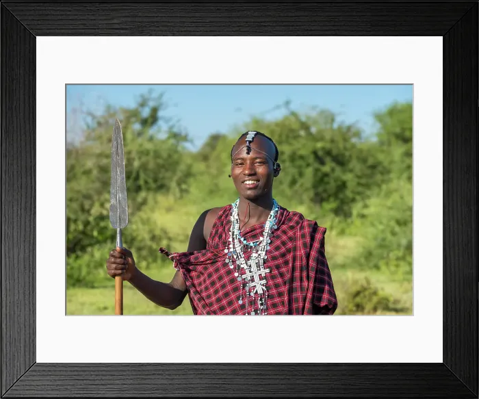 Framed Print : africa, Tanzania, Manyara Region. A young Maasai Warrior posing with his spear Framed Print : africa, Tanzania, Manyara Region. A young Maasai Warrior posing with his spear