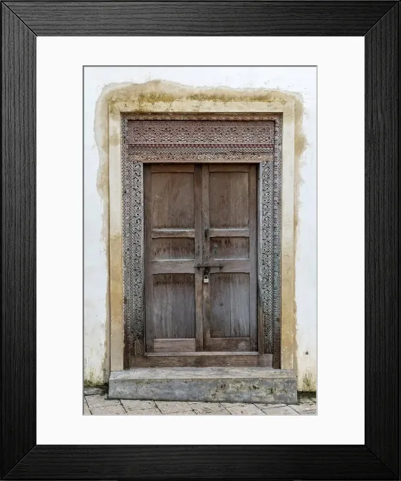 Framed Print : Old heavy carved wooden door, Stonetown, Zanzibar, Tanzania Framed Print : Old heavy carved wooden door, Stonetown, Zanzibar, Tanzania
