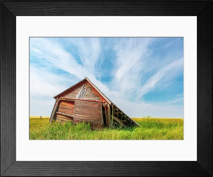 Framed Print : Falling wooden farm buildings and clouds, Champion, Alberta, Canada Framed Print : Falling wooden farm buildings and clouds, Champion, Alberta, Canada