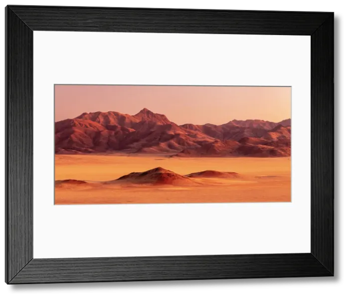 Framed Print : Mountains at sunset, Namib Rand Nature Reserve, Namib Desert, Namibia Framed Print : Mountains at sunset, Namib Rand Nature Reserve, Namib Desert, Namibia