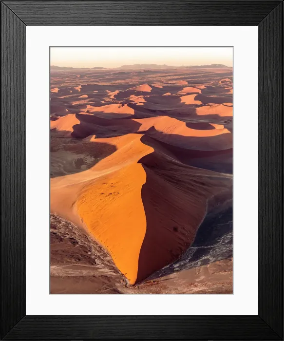 Framed Print : Aerial view of orange sand dunes from helicopter, Sossusvlei, Namib-Naukluft National Park, Namib Desert, Namibia Framed Print : Aerial view of orange sand dunes from helicopter, Sossusvlei, Namib-Naukluft National Park, Namib Desert, Namibia
