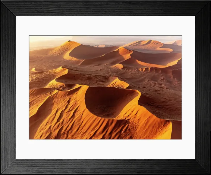 Framed Print : Aerial view of golden sand dunes at sunrise, Sossusvlei, Namib-Naukluft National Park, Namib Desert, Namibia Framed Print : Aerial view of golden sand dunes at sunrise, Sossusvlei, Namib-Naukluft National Park, Namib Desert, Namibia