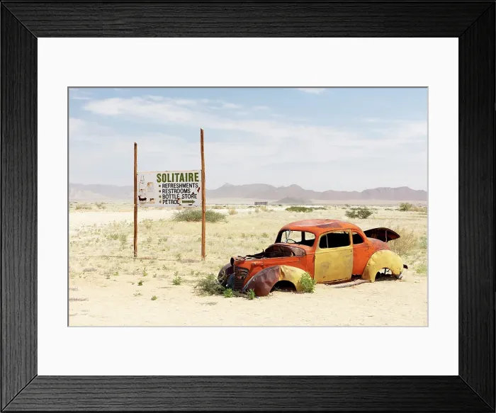 Framed Print : Shell of an old car at the remote settlement of Solitaire, Khomas Region, Namibia