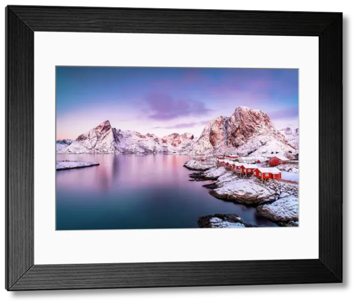Framed Print : Fishing village of Hamnoy and snowy mountains under a colorful sky at sunrise, Reine, Lofoten Islands, Norway Framed Print : Fishing village of Hamnoy and snowy mountains under a colorful sky at sunrise, Reine, Lofoten Islands, Norway