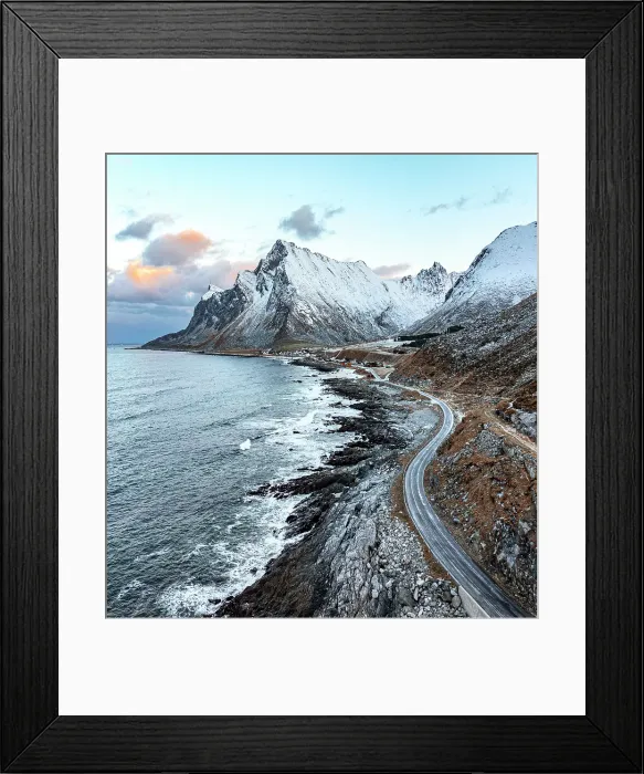 Framed Print : Aerial view of a coastal road running by the cold fjord to the fishing village of Vikten, Flakstad, Lofoten Islands, Norway Framed Print : Aerial view of a coastal road running by the cold fjord to the fishing village of Vikten, Flakstad, Lofoten Islands, Norway