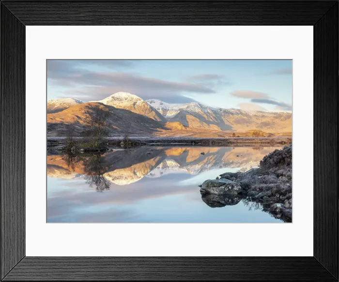 Framed Print : Snow capped mountain reflections in Lochan na h-Achlaise on a frosty winter morning in Rannoch Moor, Scottish Highlands, Scotland, UK. March 2024 Framed Print : Snow capped mountain reflections in Lochan na h-Achlaise on a frosty winter morning in Rannoch Moor, Scottish Highlands, Scotland, UK. March 2024
