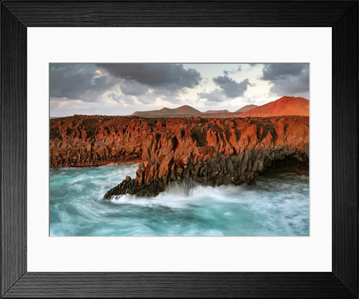 Framed Print : The volcanic coastline at Los Hervideros bathed in evening light, Yaiza, Timanfaya National Park, Lanzarote, Canary Islands, Spain Framed Print : The volcanic coastline at Los Hervideros bathed in evening light, Yaiza, Timanfaya National Park, Lanzarote, Canary Islands, Spain