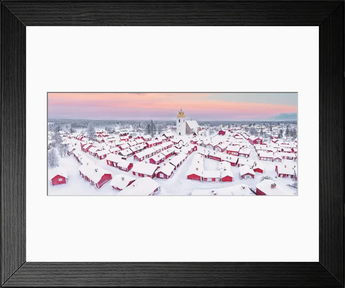 Framed Print : Pink arctic sunrise over the snowy red cottages and bell tower in the old Gammelstad Church Town, aerial view, Lulea, Sweden Framed Print : Pink arctic sunrise over the snowy red cottages and bell tower in the old Gammelstad Church Town, aerial view, Lulea, Sweden