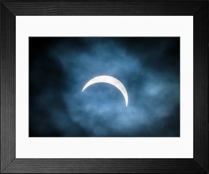 Framed Print : 90% partial eclipse of the sun on a cloudy afternoom, Greater Sudbury, Ontario, Canada Framed Print : 90% partial eclipse of the sun on a cloudy afternoom, Greater Sudbury, Ontario, Canada