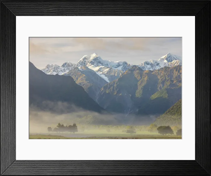 Framed Print : Aoraki (Mount Cook) and Mount Tasman at dawn on a misty morning, Fox Glacier, West Coast, South Island, New Zealand. Autumn (May) 2025 Framed Print : Aoraki (Mount Cook) and Mount Tasman at dawn on a misty morning, Fox Glacier, West Coast, South Island, New Zealand. Autumn (May) 2025