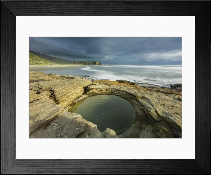 Framed Print : Layered limestone circular rock pool on the coast at Punakaiki in Paparoa National Park, West Coast, South Island, New Zealand. Autumn (May) 2025 Framed Print : Layered limestone circular rock pool on the coast at Punakaiki in Paparoa National Park, West Coast, South Island, New Zealand. Autumn (May) 2025