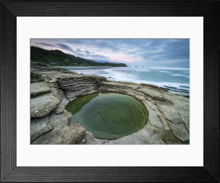 Framed Print : Layered limestone circular rock pool on the coast at Punakaiki in Paparoa National Park, West Coast, South Island, New Zealand. Autumn (May) 2025 Framed Print : Layered limestone circular rock pool on the coast at Punakaiki in Paparoa National Park, West Coast, South Island, New Zealand. Autumn (May) 2025